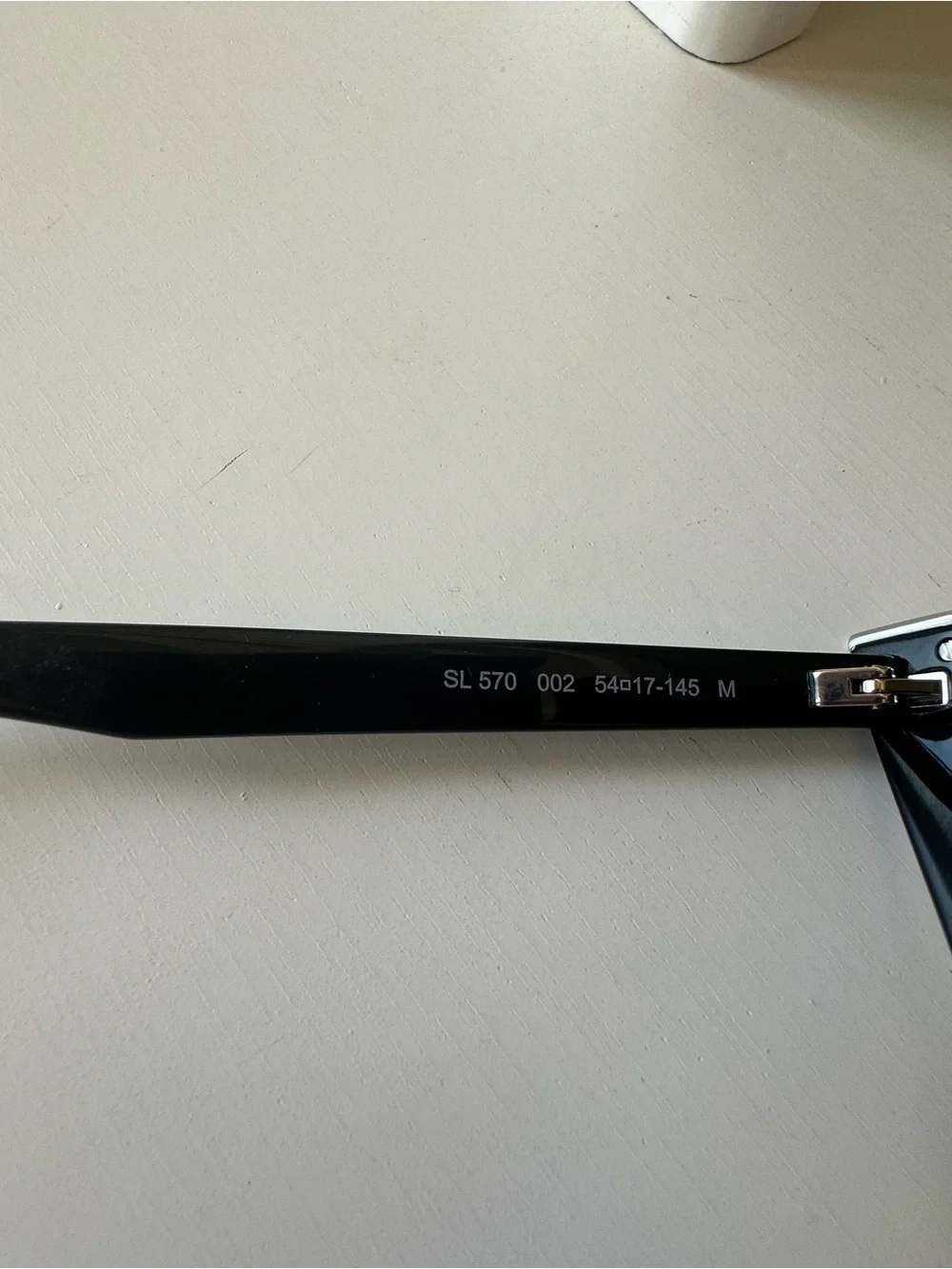 Yves Saint Laurent Black Cat-Eye Sunglasses with Silver Accent - Picture 8 of 9